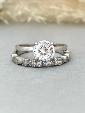 Sterling Silver Round 100 Facet Moissanite Hidden Halo 2pc Wedding Band Ring Set